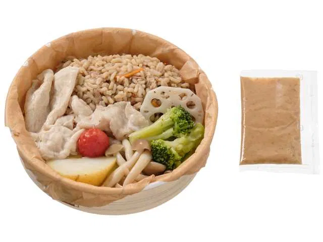 Sesame-dressed steamed vegetables and pork shabu-shabu over rice
