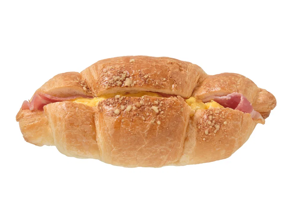 Croissant with generous egg and bacon filling