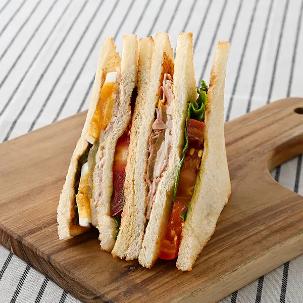 Limited to parts of Tokyo and Kanagawa: Clubhouse Sandwich with Domestic Chicken Breast, Thick-Cut Tomato, and Hard-Boiled Egg